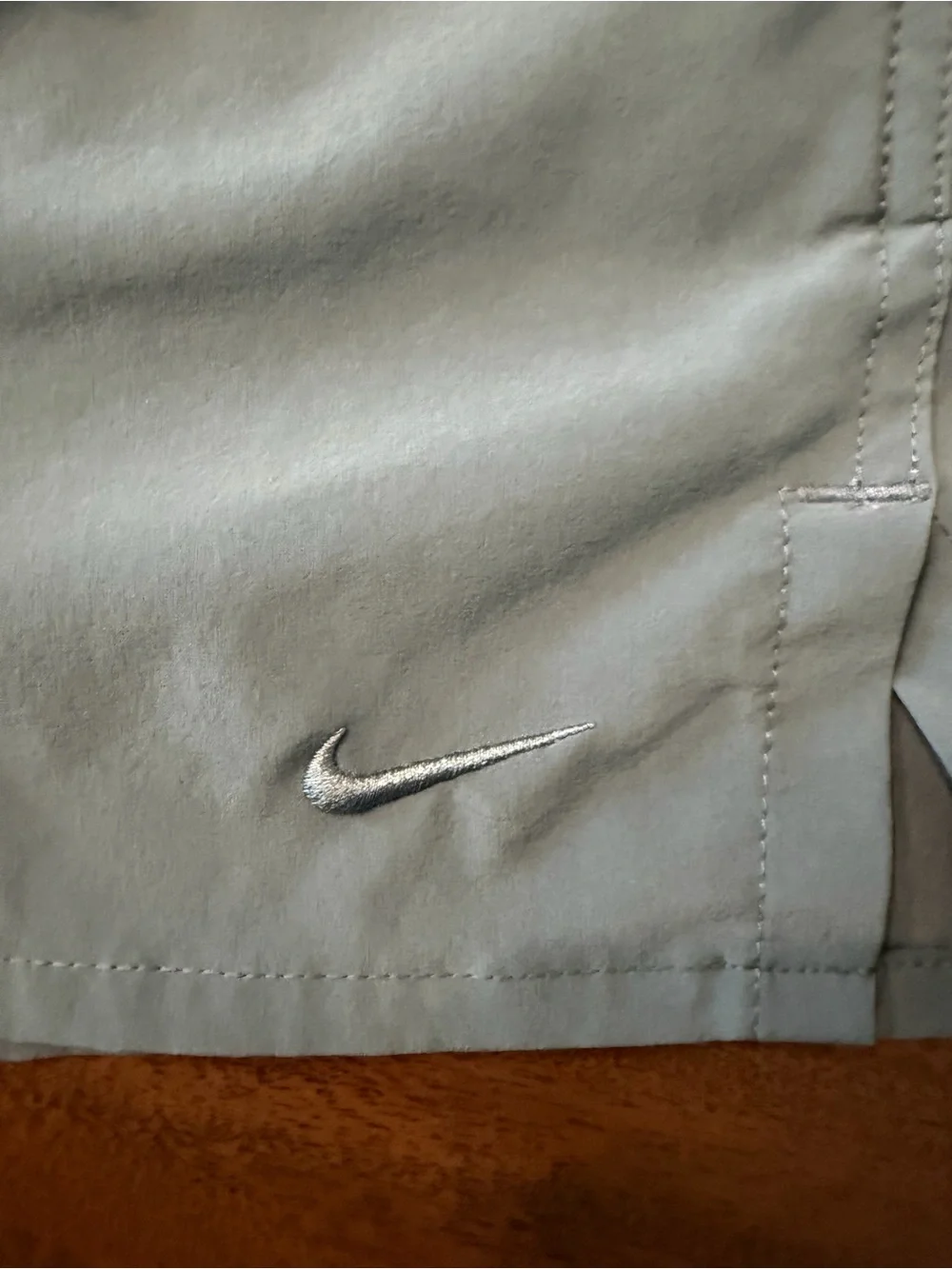 Nike Men’s Light Gray Athletic Shorts with Black Drawcord